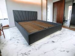 Łożko tapicerowane Sun z pojemnikiem